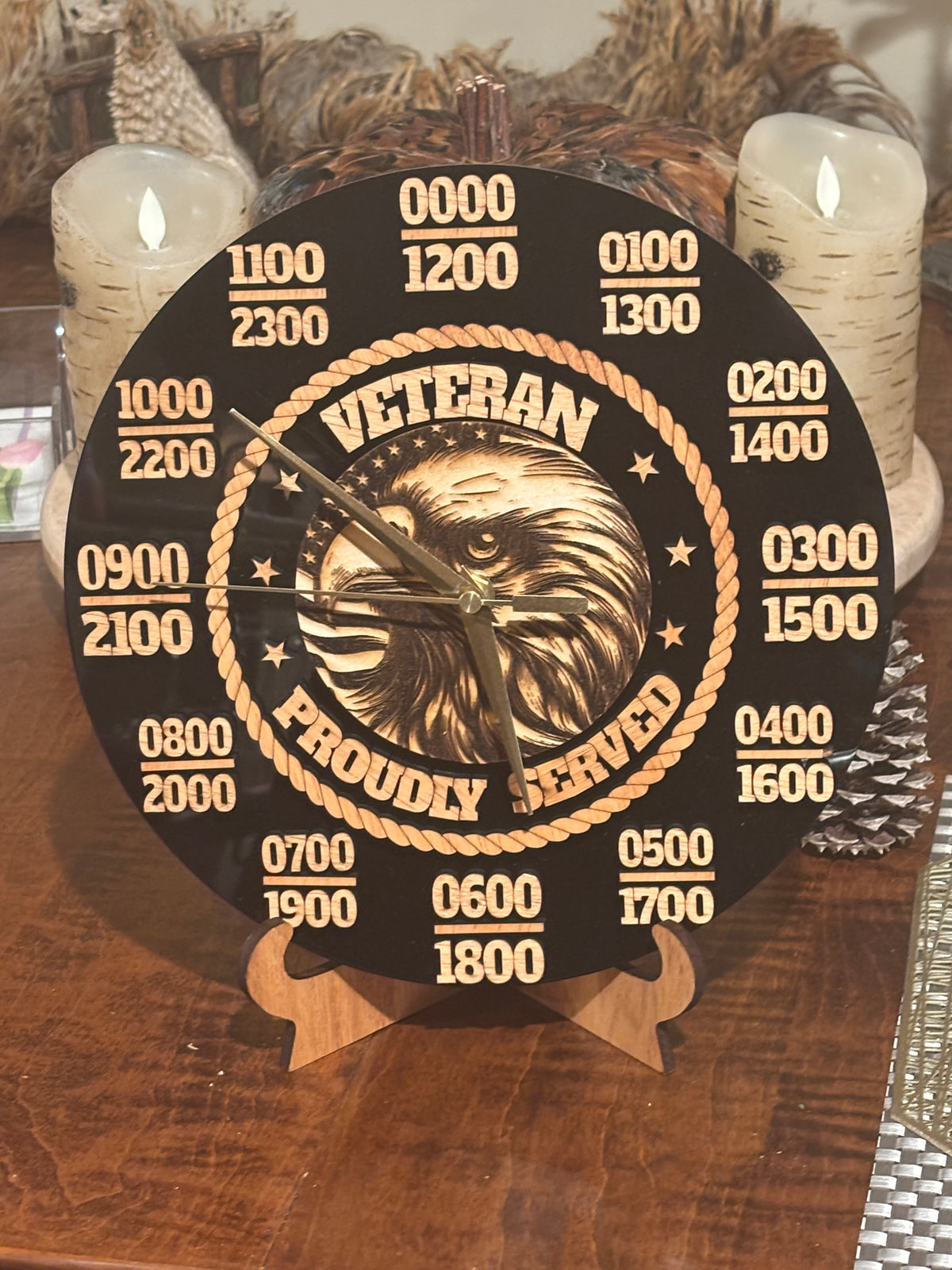 Created to honor the men and women who served our country, this handcrafted Veterans Military Time Clock is more than a way to tell time - it's a lasting tribute to service, and pride.

Features:

• Military-style 24-hour time display
• Detailed, dimensional construction
• Precision laser- cut and engraved
• Handcrafted and individually assembled
• Silent- sweep clock movement - no annoying ticking
• Designed and made in Beaufort, South Carolina
The clocks have a sawtooth hanger on the back for easy hanging