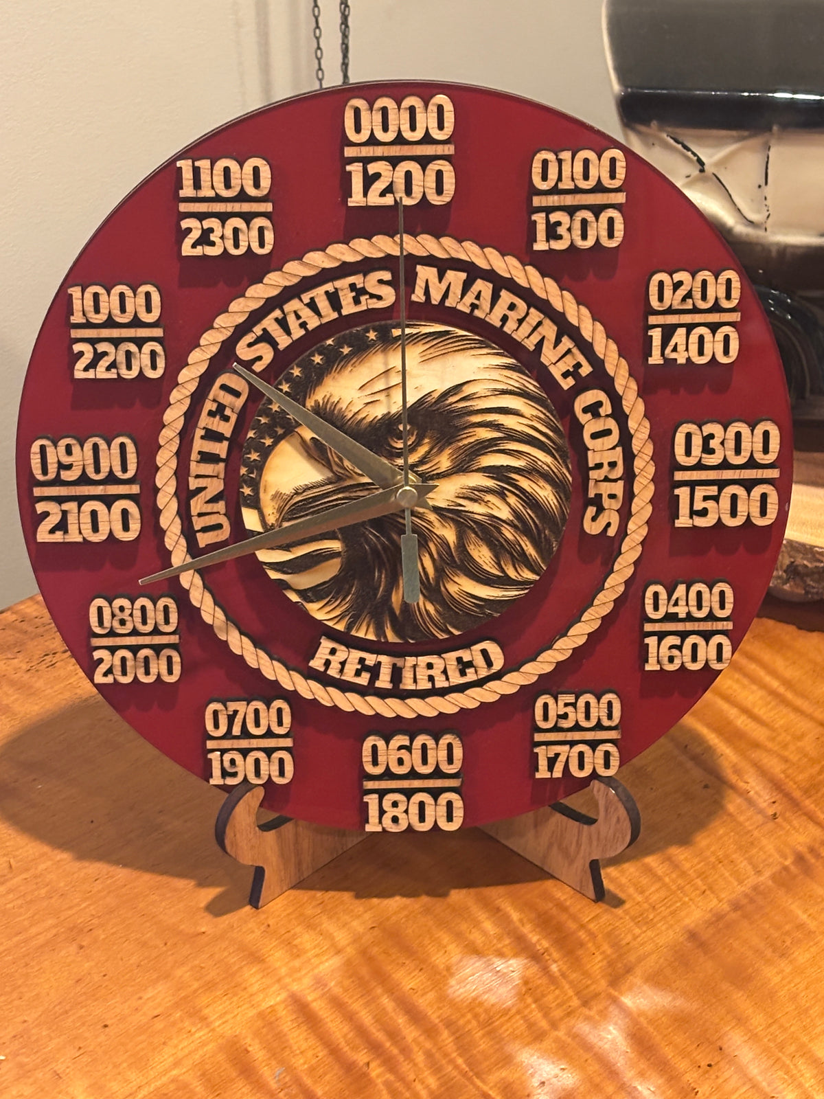 Retired Marine Wall Clock
The title may change. The pride never does. 
Created especially for Retired marines, this handcrafted multi - layered clock features a bold American eagle design honoring a lifetime of service to the corps and the country.
This clock is a distinctive retirement gift or lasting display of Marine Corps Pride.  
Multi-layered• Handcrafted• Silent-Sweep Movement •Made in Beaufort, South Carolina

 Once a Marine. Always a Marine.

